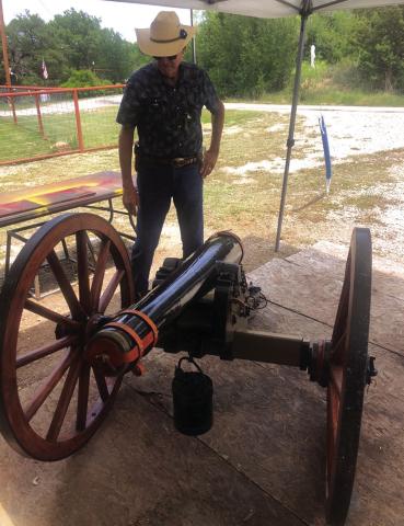 SCV member, Ross J. Cox, Sr., examines a ½ scale cannon near Brownwood as the Saltworks Camp plans to acquire a full-scale model. Photo by Michael Oliver