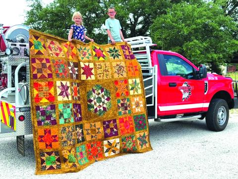 The Cherokee Volunteer Fire Department is gearing up for its annual fundraising event featuring a Fish Fry, raffle and auction. Pictured is the Cherokee ladies handmade quilt to be raffled on September 9, the Saturday after Labor Day. The quilt is an oversize queen and features fall colors and many stars. You may purchase tickets for a donation of $1, or 6 tickets for $5 or 26 for $20 from the Cherokee ladies, Arrowhead bank, Salon 325, or Maurine Johnson @ (210) 859-0653. Courtesy of Aileen Roberts