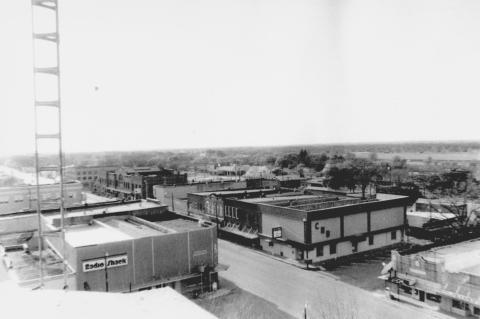 Aerial view of the square facing west from the courthouse in downtown San Saba. Taken from the April 1985 Annual Newcomers Guide, a supplement of the San Saba News &amp; Star. Photographer unknown.