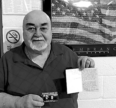Alan Hill receiving the gift card and note from the HCC