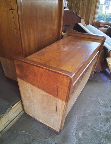 The church suffered major flood damage; you can see the floodline in the photo. On Monday, July 7th, members of the church were busy cleaning up trying to see what was salvageable.