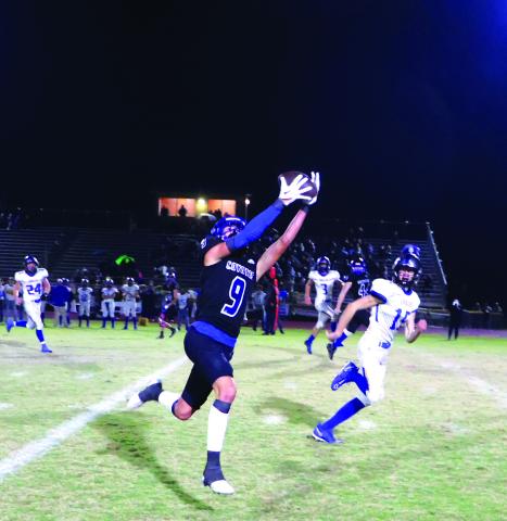Hutton Rogers (#09) in a beautiful catch last Friday night in the win over Sidney. Courtesy of Mr. Womack