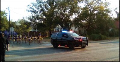Sgt. Charlie Boyce of the San Saba Police Department escorted the Dilloettes and Band to the graveyard for the game last Friday night. Courtesy of Carolyn Preece
