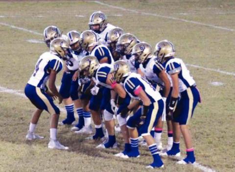 Reagan Mejia rallies the team before kick-off. (Photo submitted by Deanne Cromer)