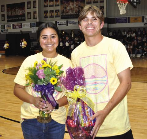BAND SWEETHEART and BAND BEAU, Jazmin Gutierrez-Davila and Everett Eidson, holding their awards presented to them at the last pep rally.