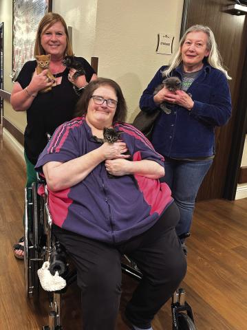 Regina Baker (left) and Kim Wells (right) of San Saba County Friends of Animals braved the rain on Thursday to take four kittens to visit the San Saba Nursing Home Residents. Pictured here with Mrs. Baker and Mrs. Wells is resident Renee Spurgeon. The Residents were able to hold and pet the kittens and really seemed to enjoy their time with them. For more information on the kittens that are available for adoption, visit sansabaanimals.com. Photo courtesy of Regina Baker